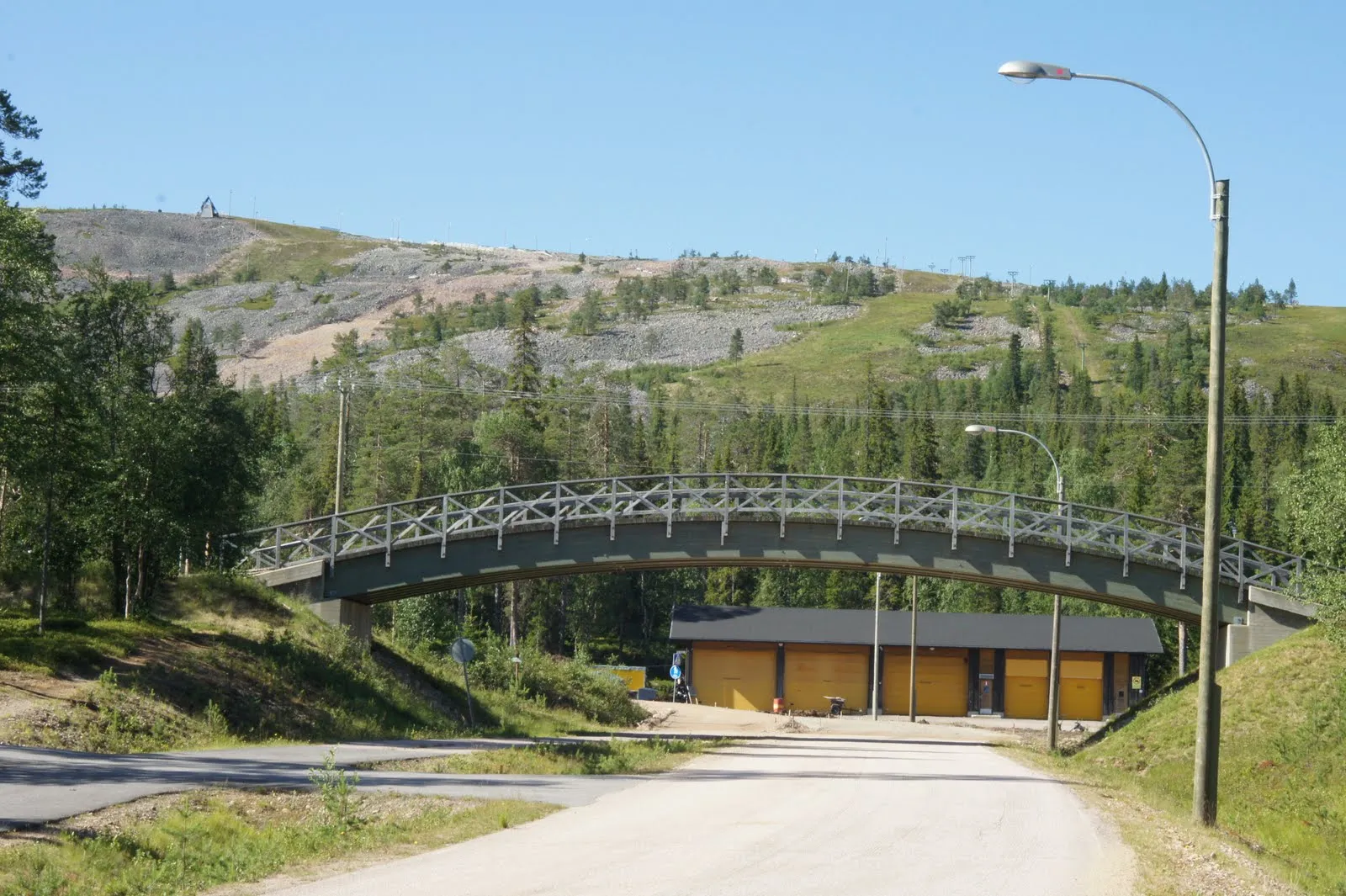 During winter cross-country ski tracks are passing over that bridge