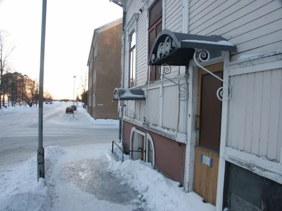 House with ice stalactites